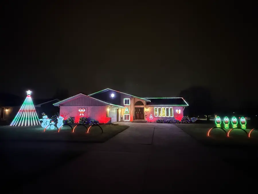 The whole yard with the house washed in red.